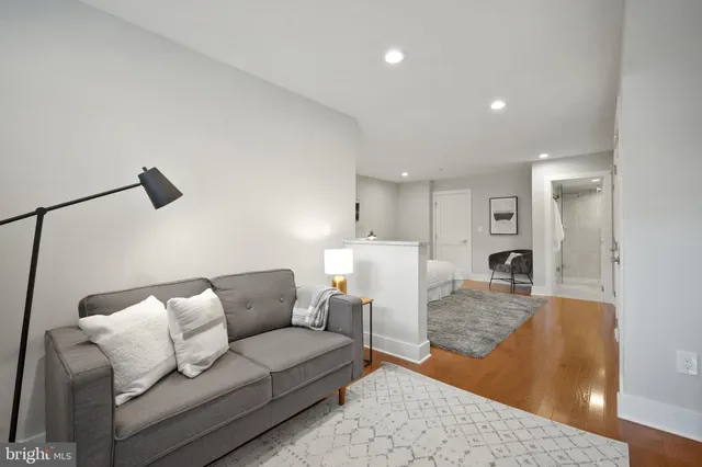 a living room with furniture and a couch