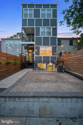 a view of a building with sitting area