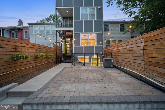 a view of a house with a street