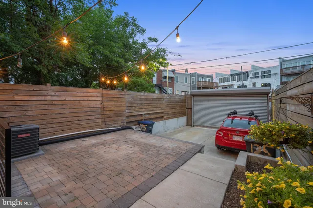 a view of a terrace with sitting area