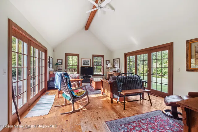 a living room with furniture and a window