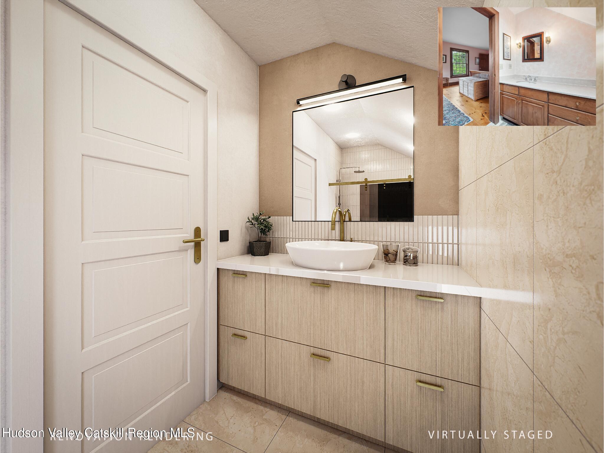 2205 County Rte 5 Canaan, NY 12029 - Photo 21 of 45 a bathroom with a double vanity sink and mirror