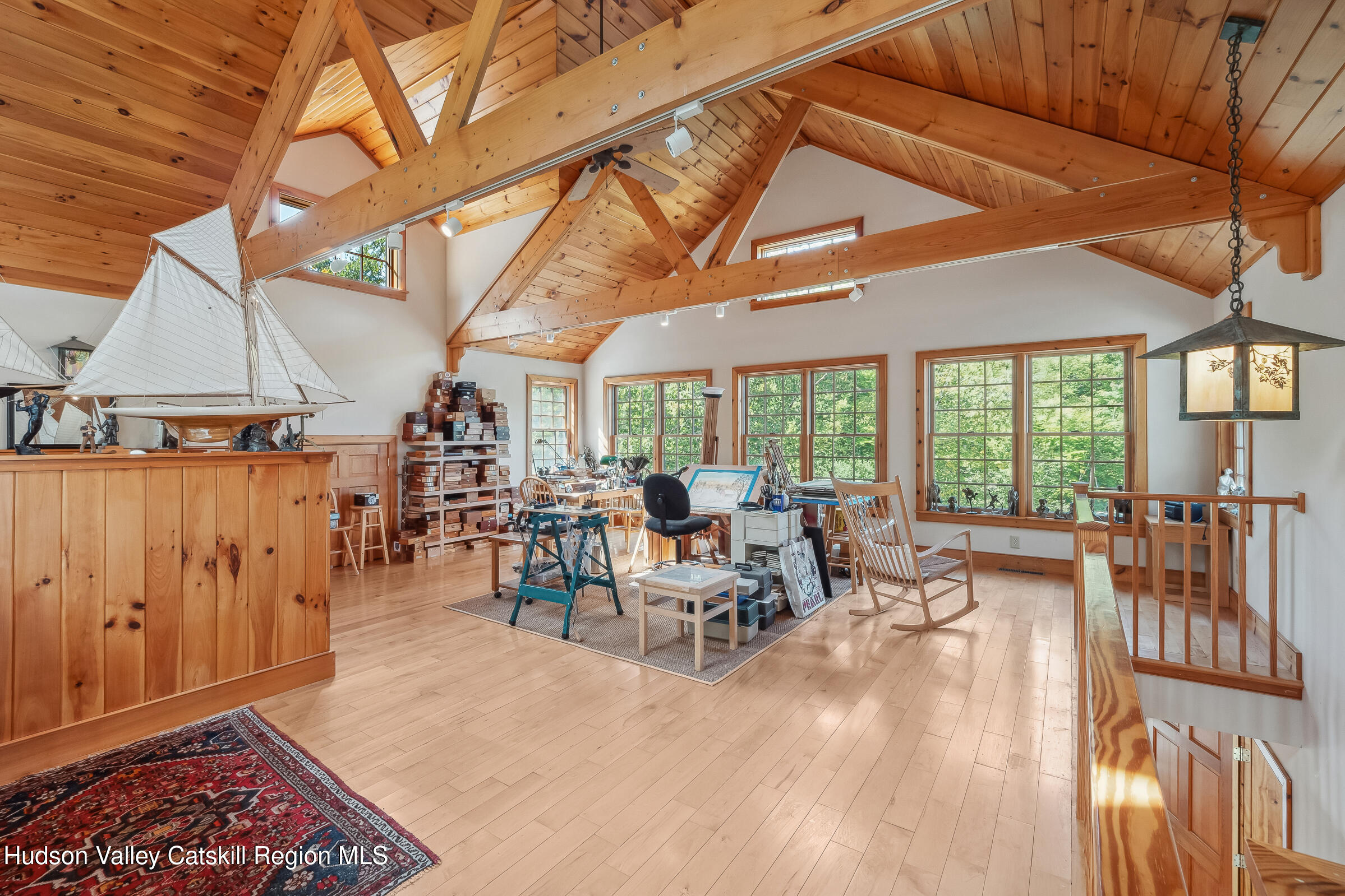 2205 County Rte 5 Canaan, NY 12029 - Photo 32 of 45 a room with lots of tables a large window and chairs