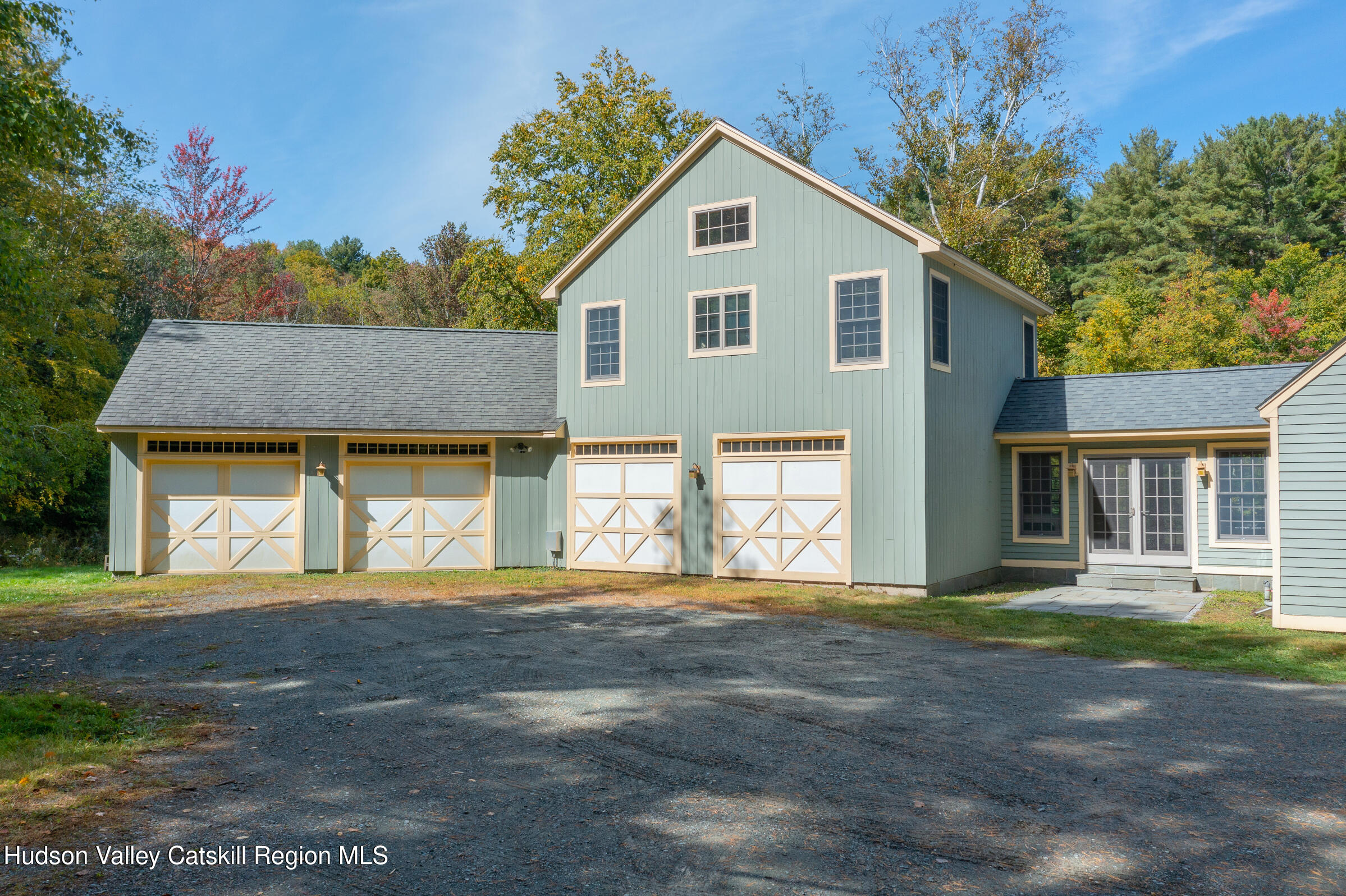 2205 County Rte 5 Canaan, NY 12029 - Photo 37 of 45 a front view of a house with a yard and garage