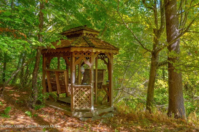 a view of a wooden door and chair