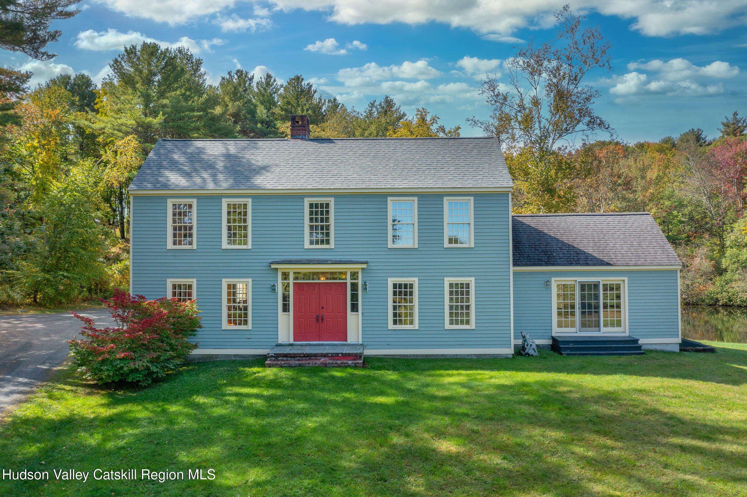 2205 County Rte 5 Canaan, NY 12029 - Photo 44 of 45 a front view of a house with a garden