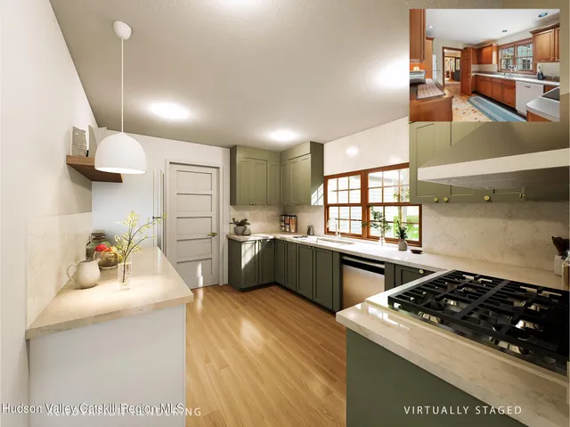 a kitchen with a sink a stove and refrigerator