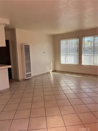 a kitchen with a cabinets and a stove top oven