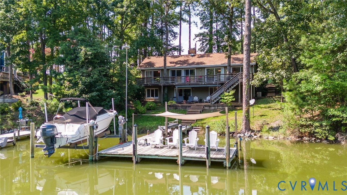 a view of house with swimming pool