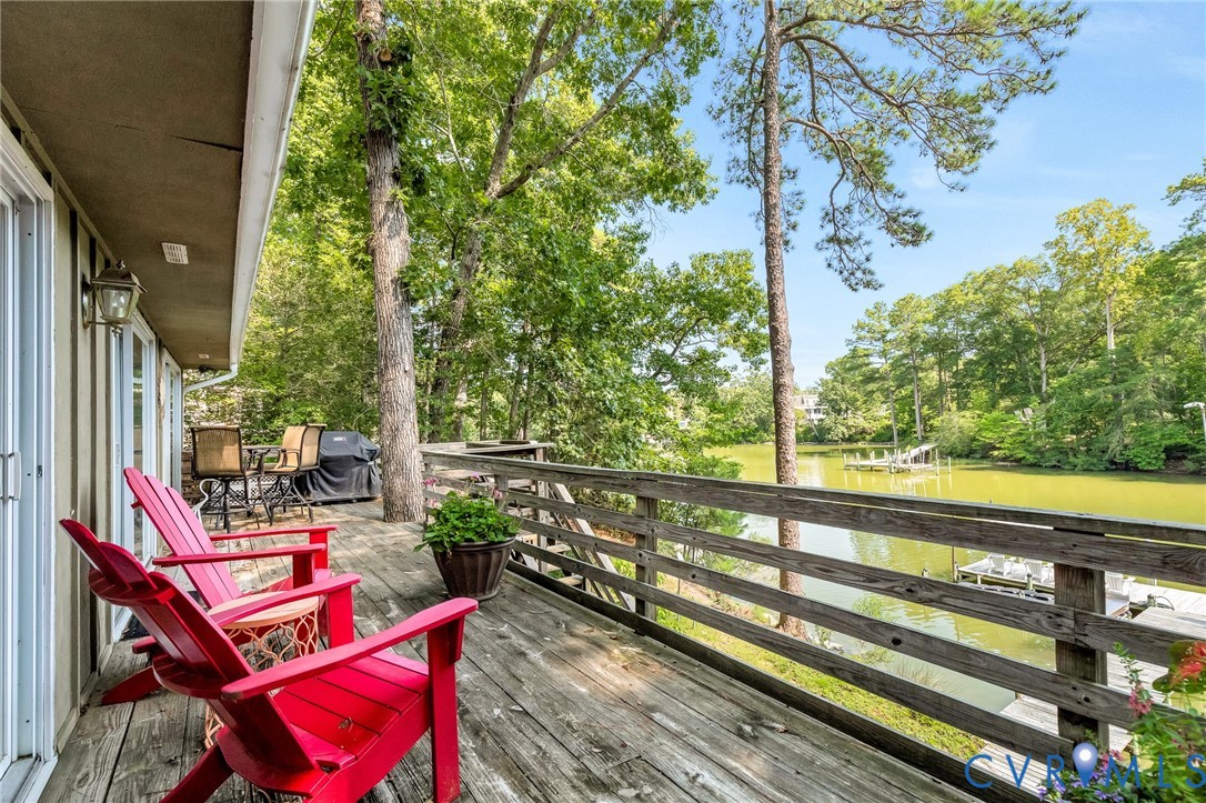 200 Pond Road Lancaster, VA 22503 - Photo 16 of 48 a view of a balcony with chairs