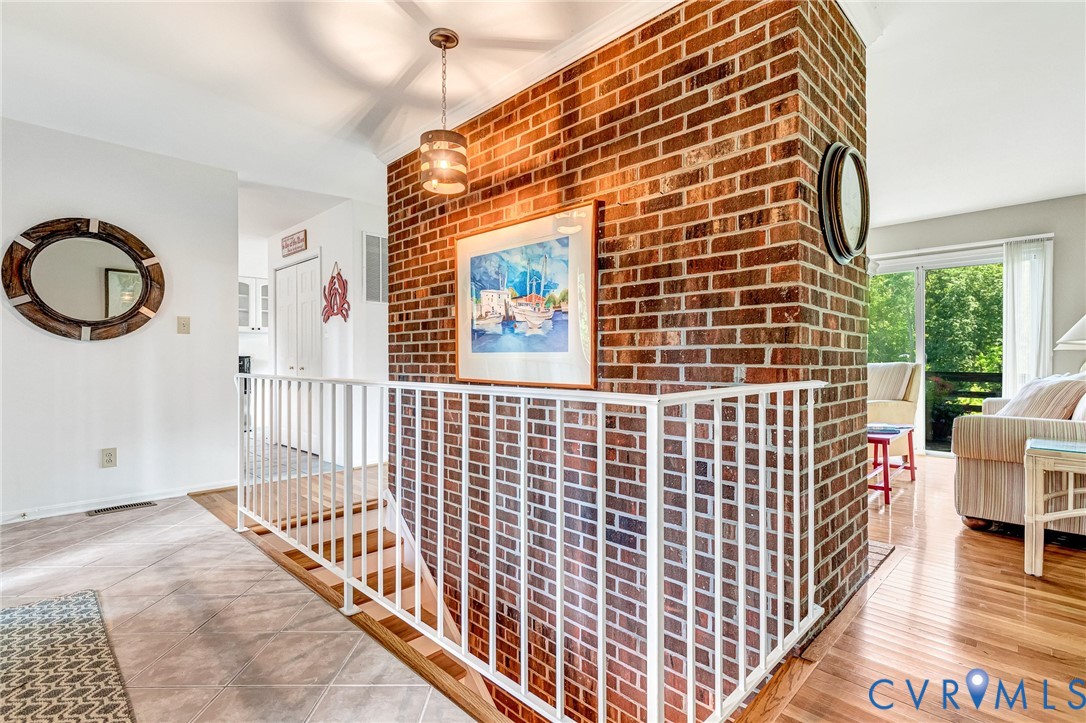 200 Pond Road Lancaster, VA 22503 - Photo 21 of 48 a view of a brick building with wooden floor and windows