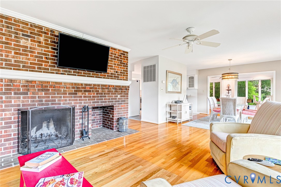 200 Pond Road Lancaster, VA 22503 - Photo 22 of 48 a bedroom with a bed and flat screen tv