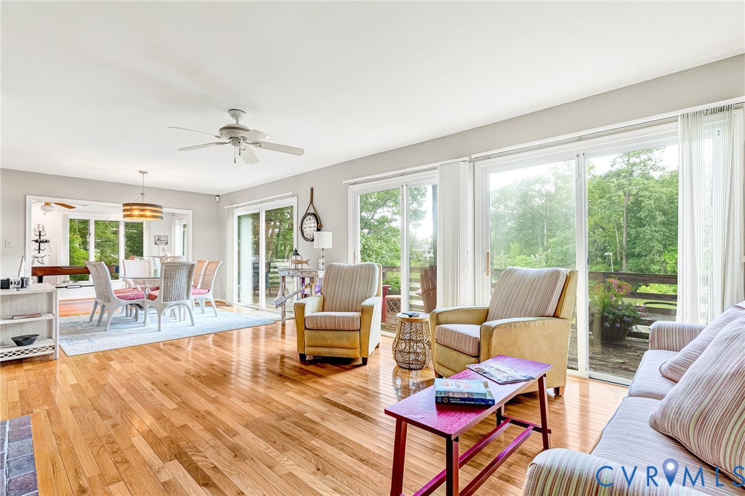 200 Pond Road Lancaster, VA 22503 - Photo 23 of 48 a living room with furniture and wooden floor