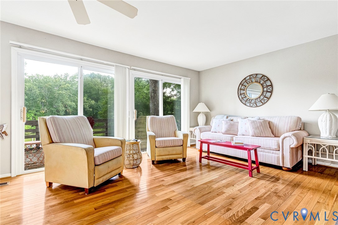 200 Pond Road Lancaster, VA 22503 - Photo 24 of 48 a living room with furniture and a large window