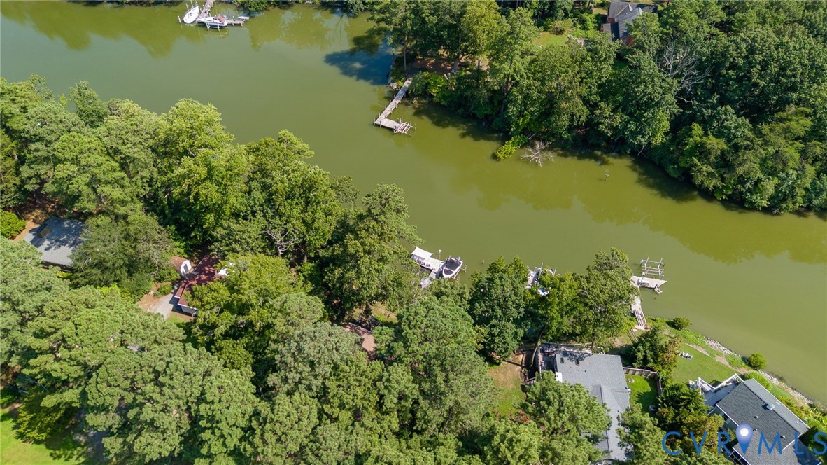 200 Pond Road Lancaster, VA 22503 - Photo 4 of 48 an aerial view of ocean residential house with outdoor space and trees all around