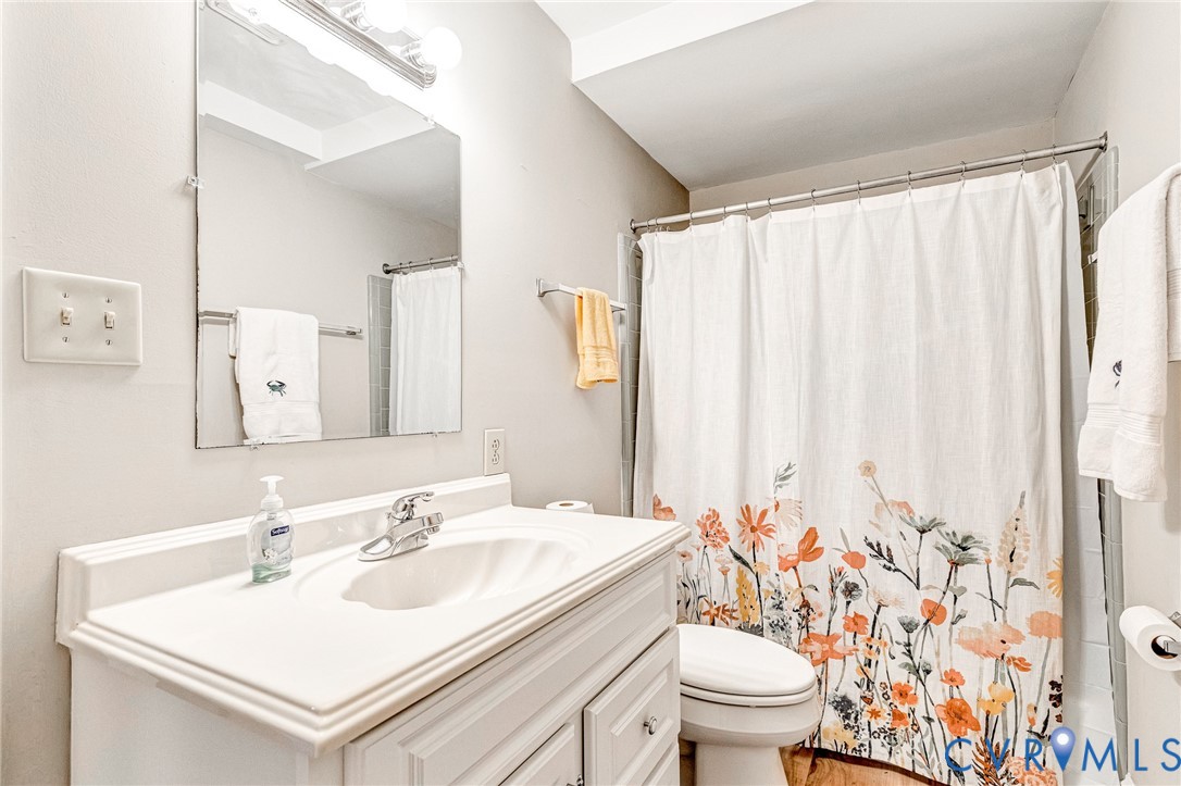 200 Pond Road Lancaster, VA 22503 - Photo 45 of 48 a bathroom with a sink toilet and shower