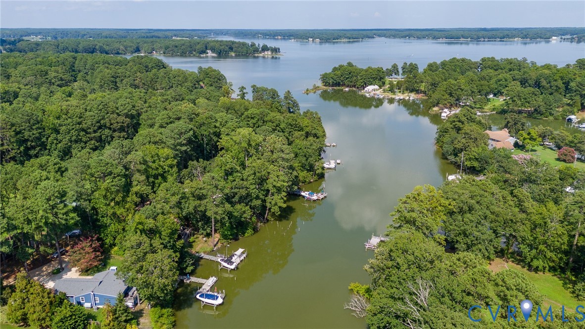 200 Pond Road Lancaster, VA 22503 - Photo 6 of 48 an aerial view of a houses with a lake view