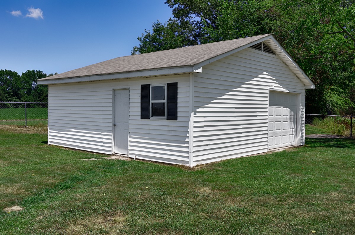 16871 New Cut Road Athens, AL 35614 - Photo 29 of 40 a front view of a house with a yard
