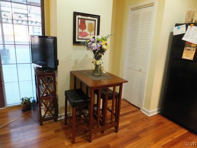 11 West 2nd Street, Unit 141 Bethlehem, PA 18015 - Photo 8 of 12 a view of a dining room with furniture and wooden floor