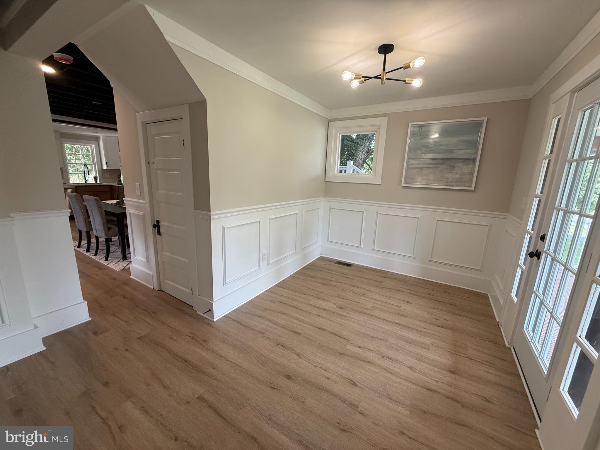 10141 Liberty Road, Unit 1 Randallstown, MD 21133 - Photo 17 of 21 a view of livingroom with hardwood floor and a ceiling fan