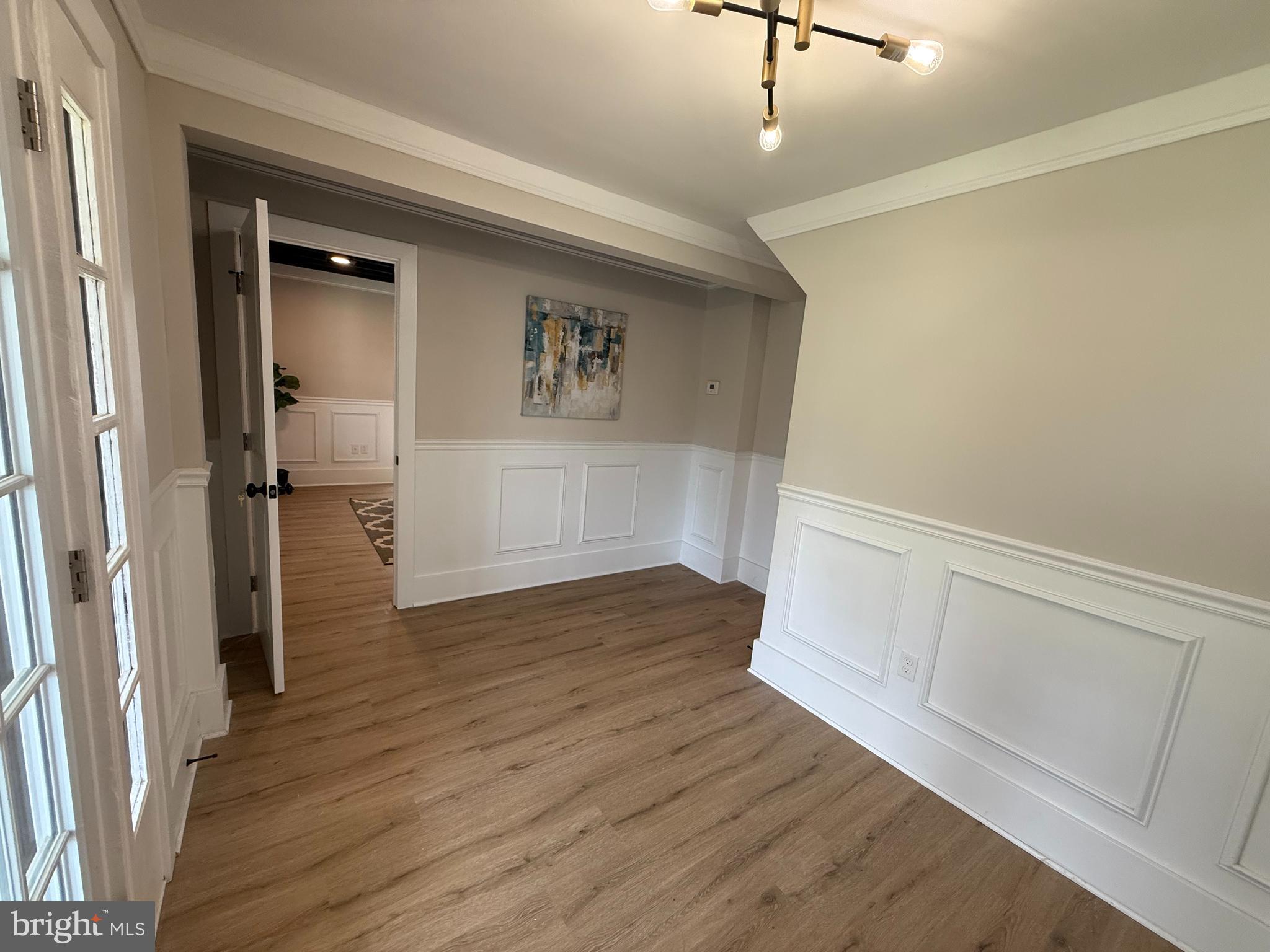 10141 Liberty Road, Unit 1 Randallstown, MD 21133 - Photo 18 of 21 a view of empty room with wooden floor