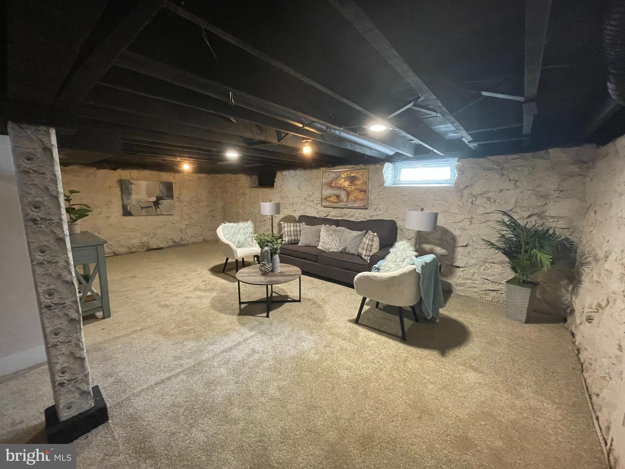 10141 Liberty Road, Unit 1 Randallstown, MD 21133 - Photo 7 of 21 a building outdoor space with patio furniture and potted plants