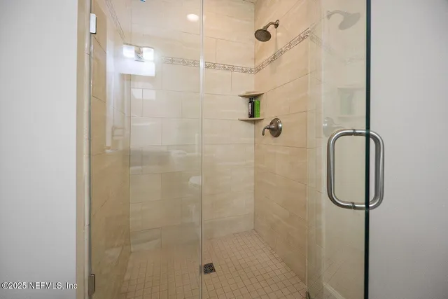a view of hallway with wooden floor