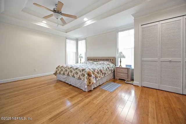 a spacious bathroom with a granite countertop sink toilet and shower