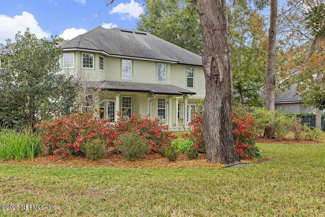 a view of swimming pool with a yard