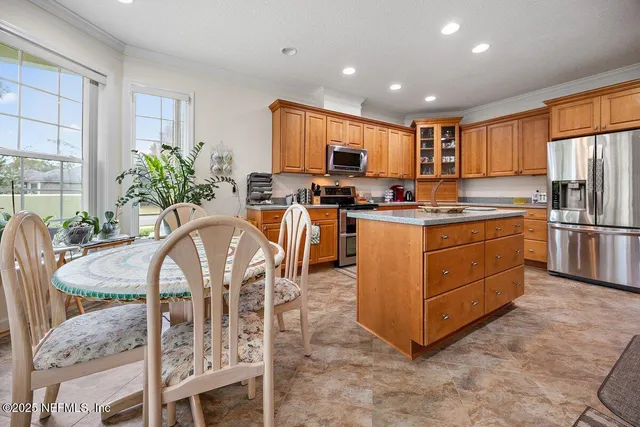 a bathroom with a toilet a sink and a mirror