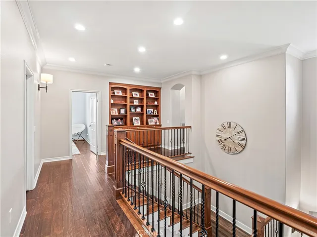 a bedroom with a bed a fireplace and a couch