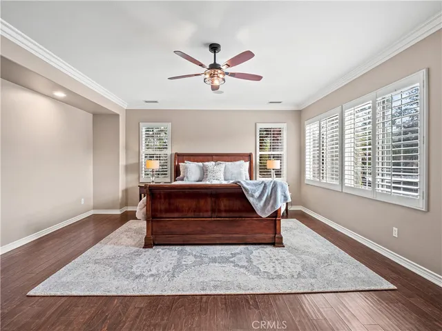 a bedroom with a bed and a fireplace