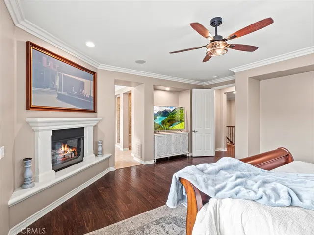 a spacious bathroom with a granite countertop sink and a bathtub