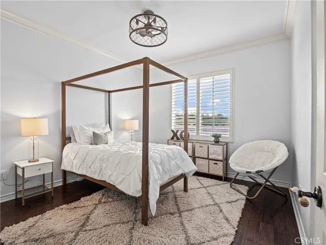 a bathroom with double sink and a mirror