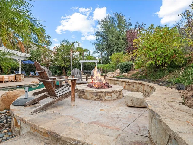 a view of a yard with a house and a garden