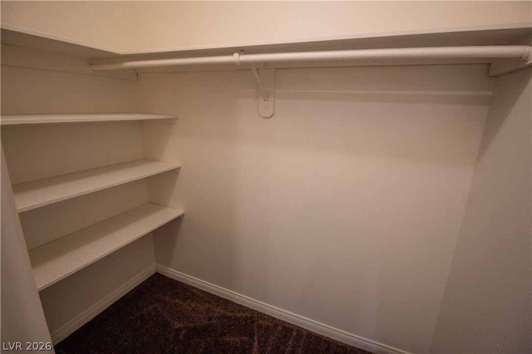 119 West Victory Road Henderson, NV 89015 - Photo 16 of 26 Ample shelving and hanging space in this well-appointed walk-in closet.
