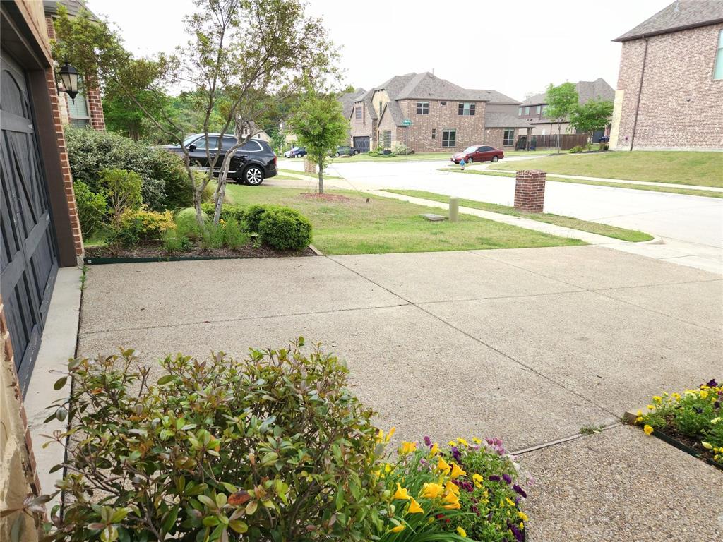 1208 Melcer Street Plano, TX 75074 - Photo 5 of 37 a view of a house with a outdoor space