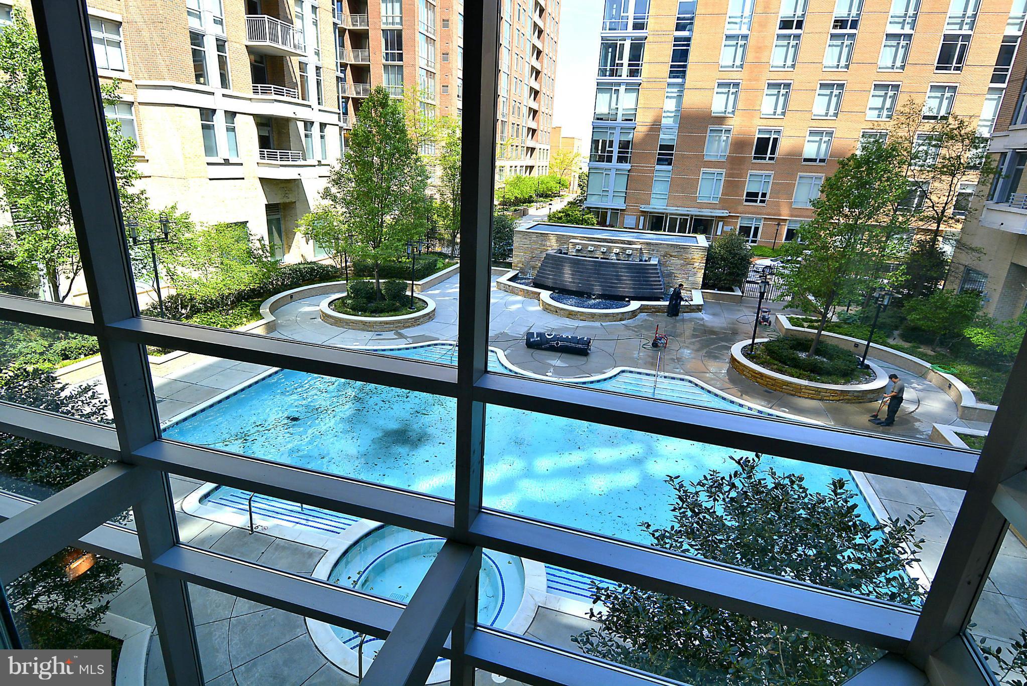 11990 Market Street, Unit 1204 Reston, VA 20190 - Photo 7 of 30 a view of a city from a balcony
