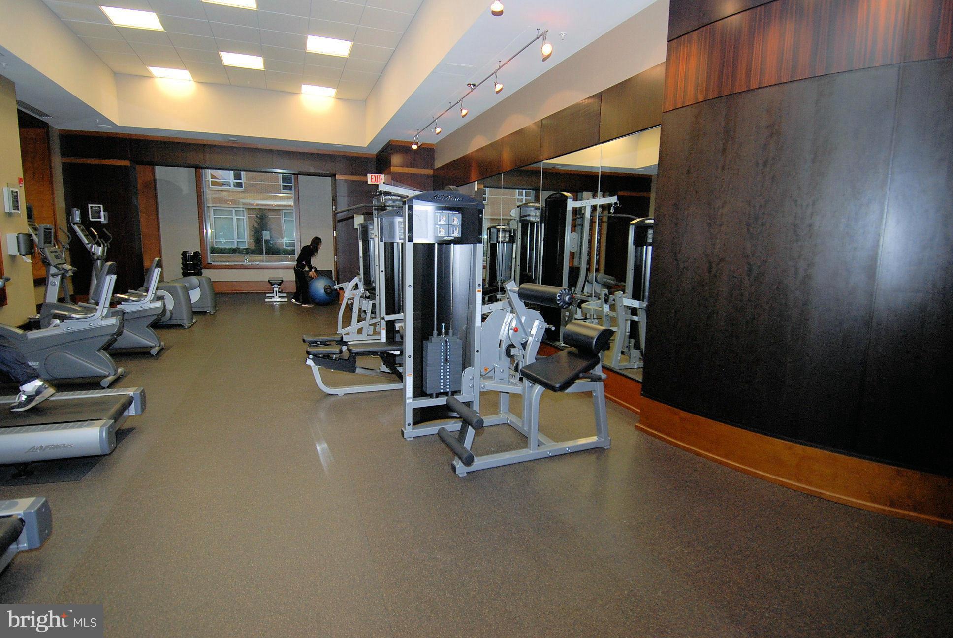 11990 Market Street, Unit 1204 Reston, VA 20190 - Photo 8 of 30 a view of a room with gym equipment