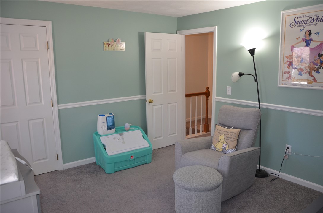 8 Sandy Lane Burrillville, RI 02830 - Photo 27 of 35 The second bedroom also boasts attractive chair rail molding.