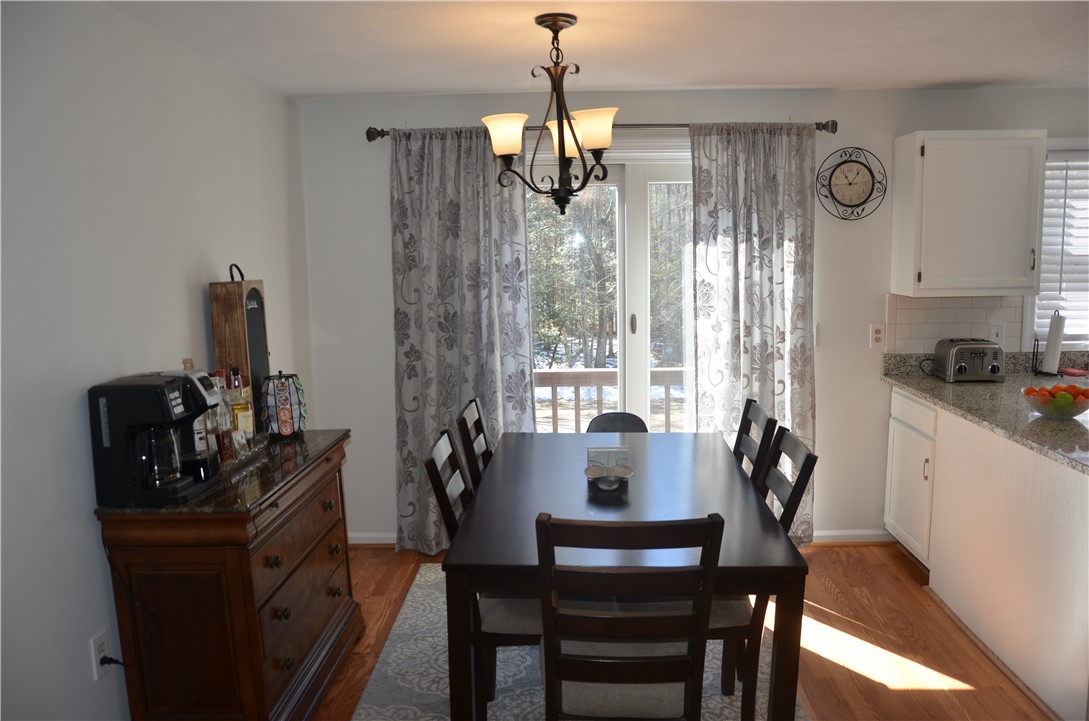 8 Sandy Lane Burrillville, RI 02830 - Photo 6 of 35 The spacious dining area with newer slider to a private deck