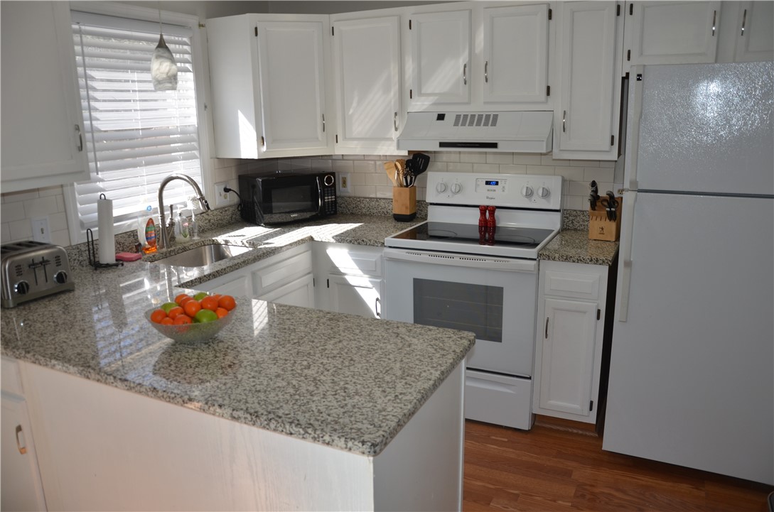 8 Sandy Lane Burrillville, RI 02830 - Photo 8 of 35 Bright and white open kitchen