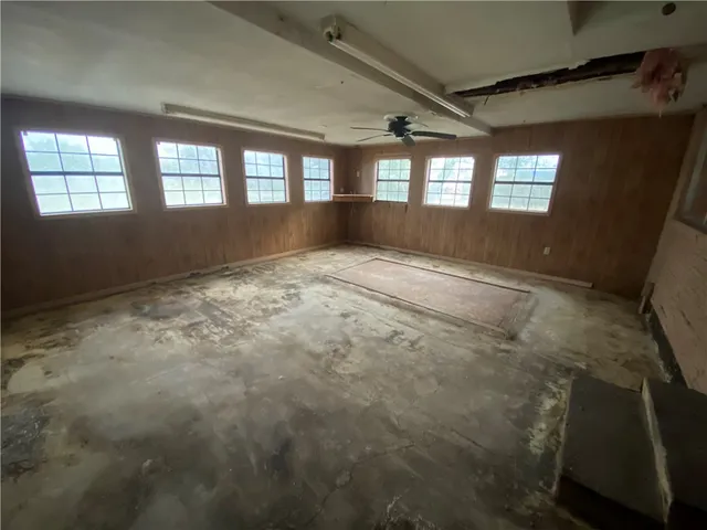 a view of an empty room and window