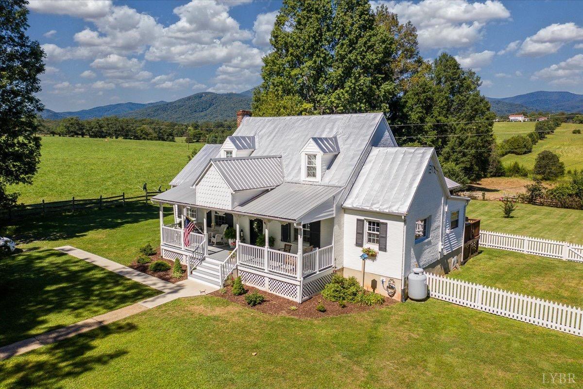 380 St Marys Road Amherst, VA 24521 - Photo 1 of 20 an aerial view of a house with swimming pool and a yard