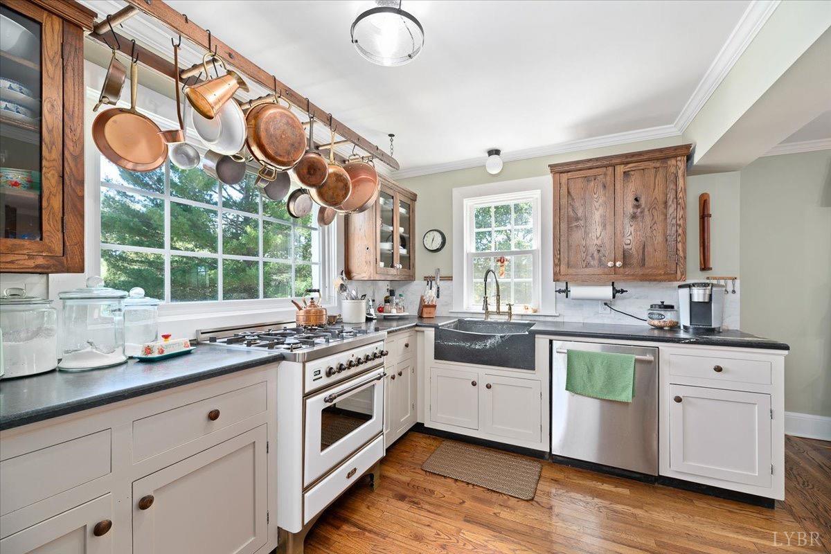 380 St Marys Road Amherst, VA 24521 - Photo 11 of 20 a kitchen with stainless steel appliances granite countertop a sink and wooden cabinets