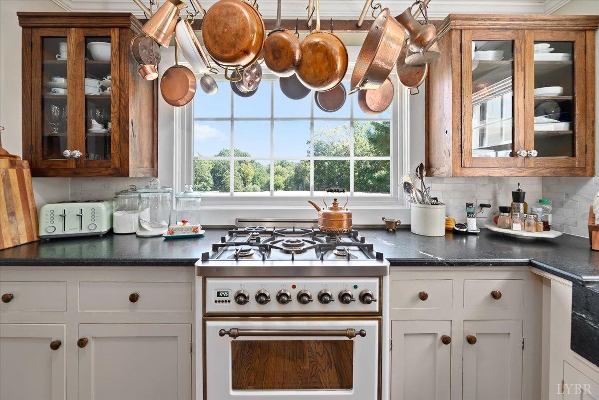 380 St Marys Road Amherst, VA 24521 - Photo 10 of 20 a kitchen with stainless steel appliances granite countertop white cabinets and a stove