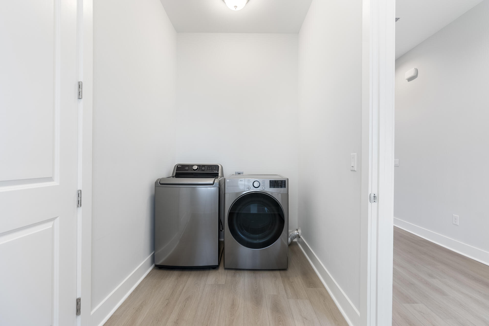 248 Euvino Way Santa Rosa Beach, FL 32459 - Photo 12 of 56 a utility room with dryer and washer