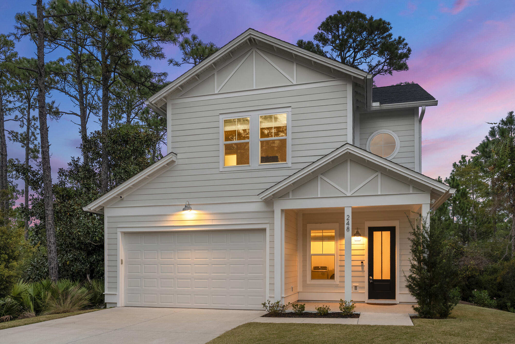 248 Euvino Way Santa Rosa Beach, FL 32459 - Photo 2 of 56 a front view of a house with a yard