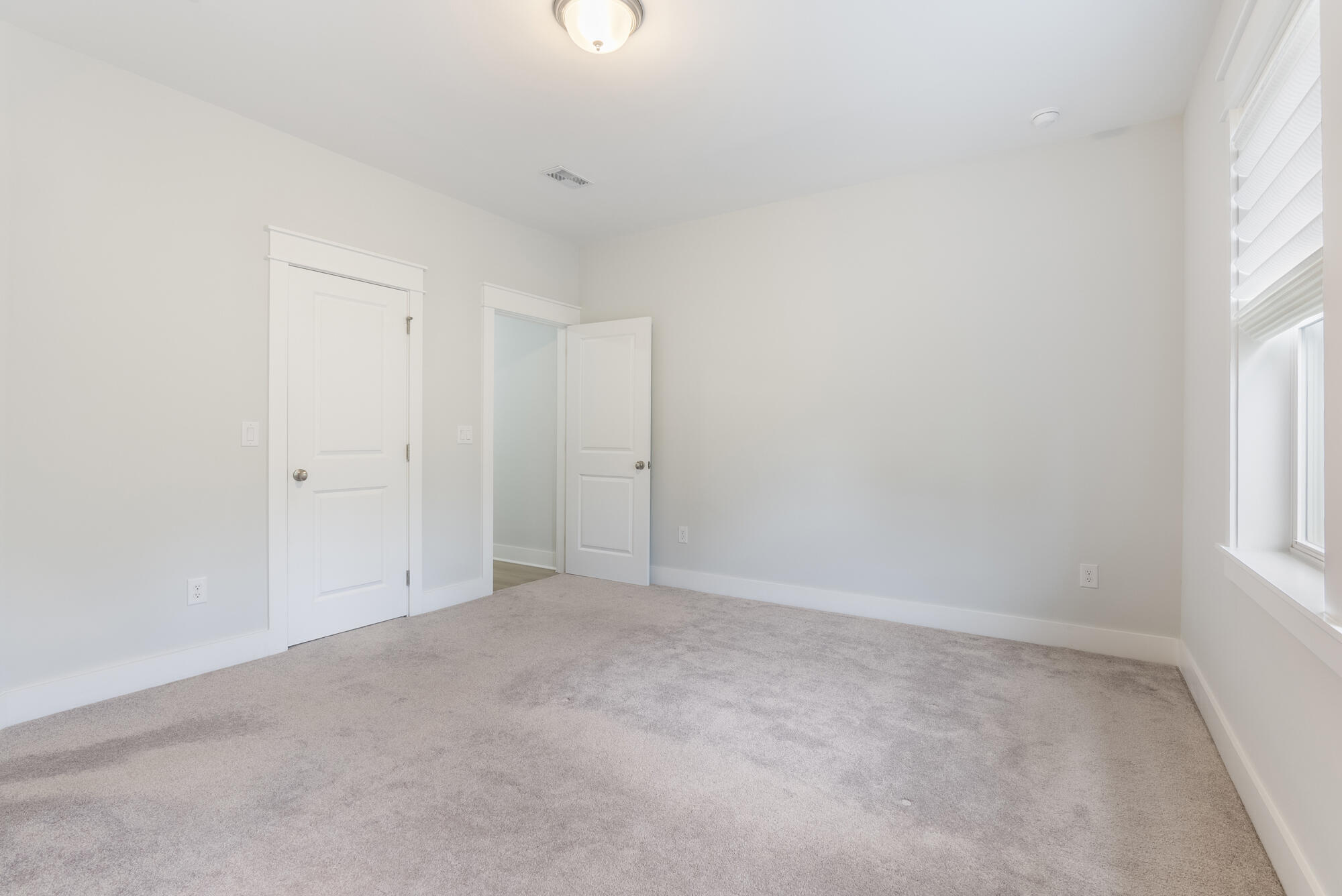 248 Euvino Way Santa Rosa Beach, FL 32459 - Photo 27 of 56 an empty room with windows