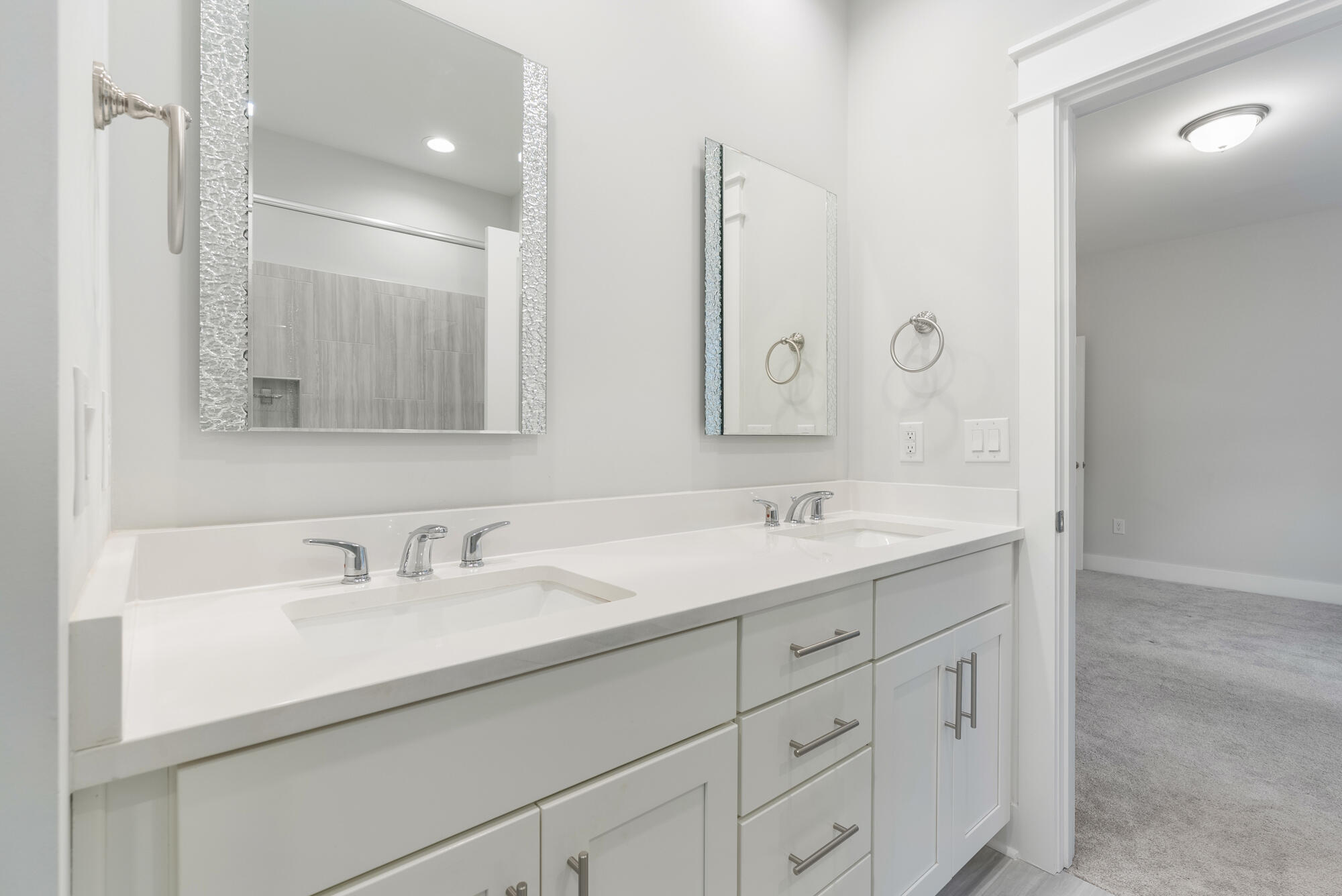 248 Euvino Way Santa Rosa Beach, FL 32459 - Photo 31 of 56 a bathroom with double sink and a mirror